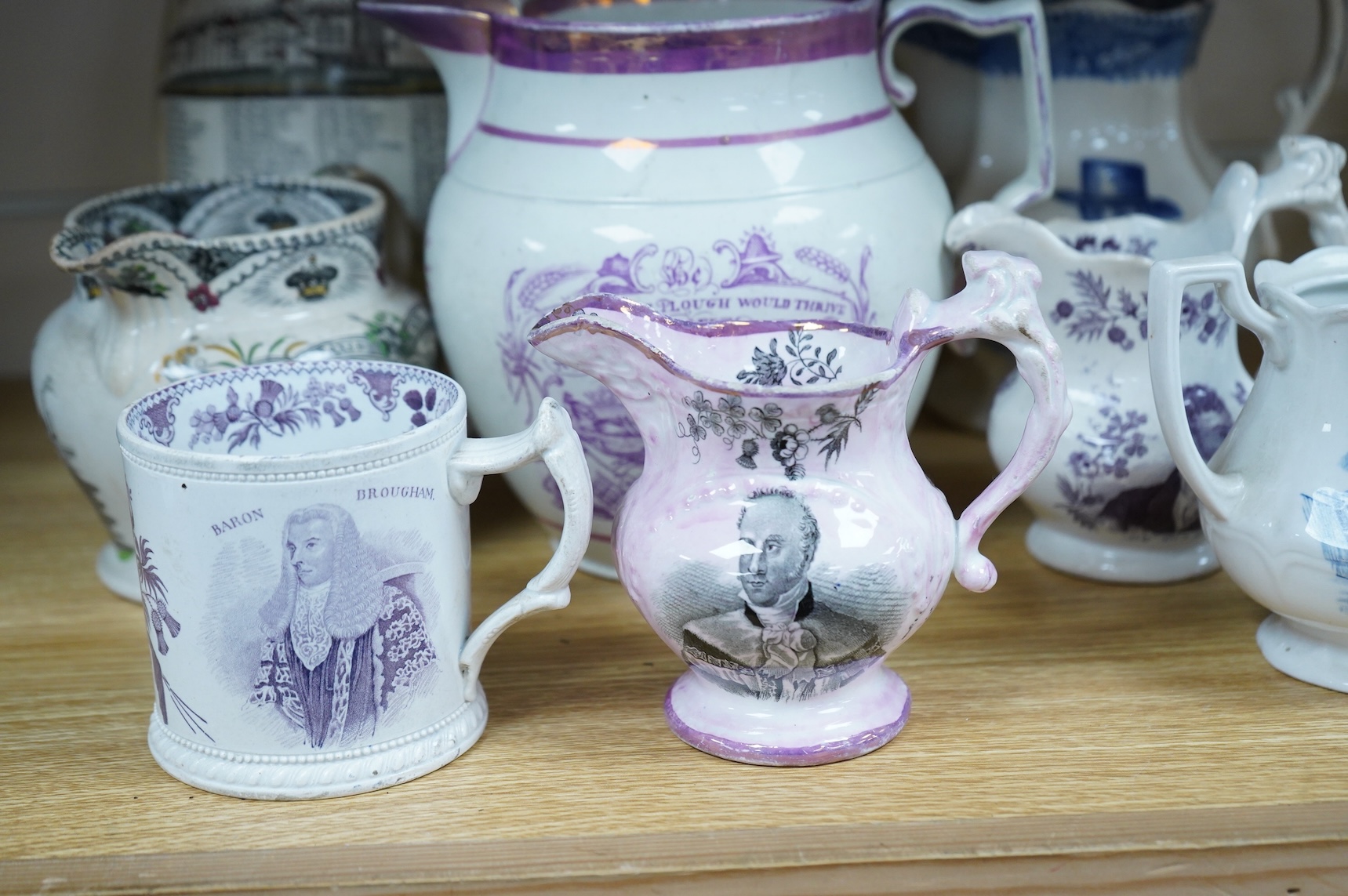 Eleven early to mid 19th century jugs, mugs and plates, all with transfer printed commemorative themes including Gladstone as Prime Minister, Queen Victoria‘s 1887 Jubilee, the Bidston Lighthouse Signals, Lord John Russe